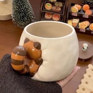 Cream Ceramic Planter with Brown & Orange Raccoon Accent